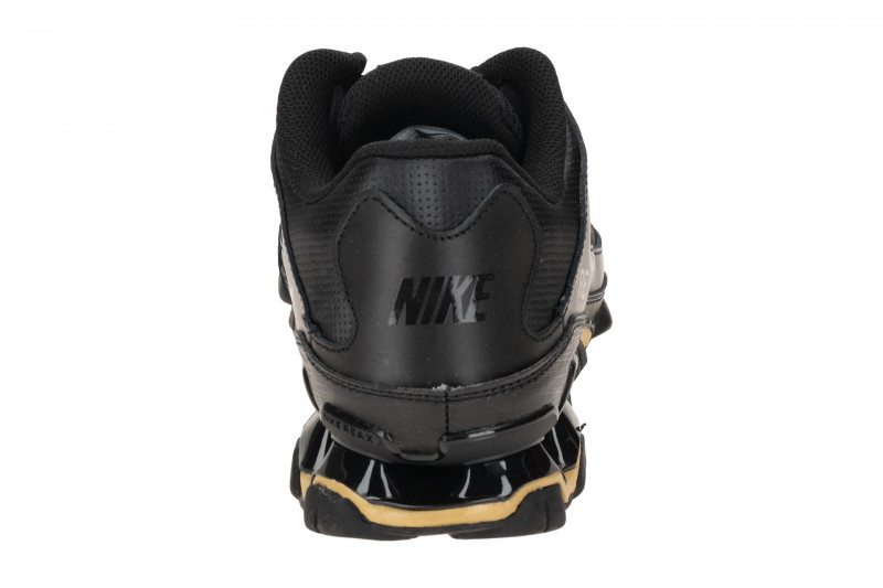 NIKE Reax Schuhe schwarz gold Herren Trainer